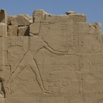 Figure 2. Thutmes III imposing order over chaos, the enemies of Egypt, on the seventh pylon at Karnak